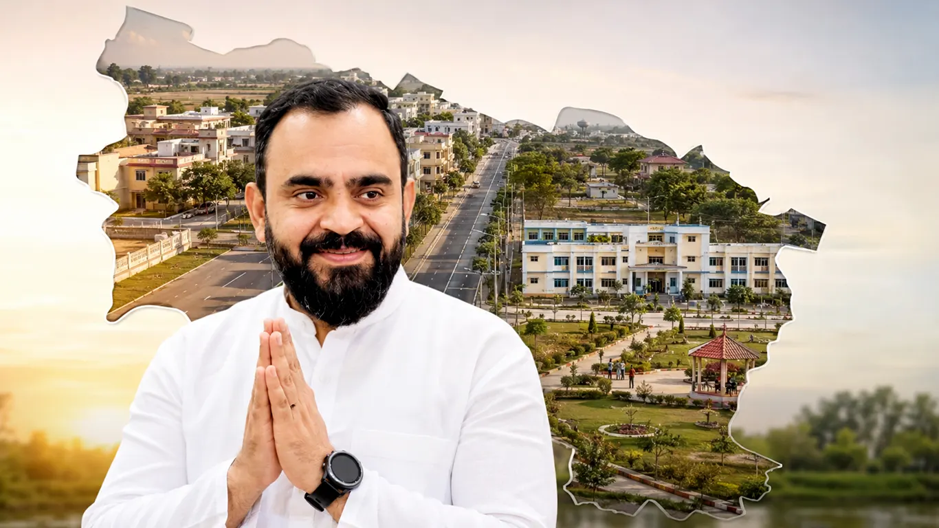 Agam Chaudhary with hands folded in namaste, in front of an outline of the constituency filled with photographs of Chhaprauli's roads, houses, public buildings and the riverfront